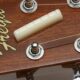 Unveiling the Secrets of the Acoustic Guitar Nut: A Journey to Enhanced Playability and Tone - Master the Art of Playing Guitar and Play Like a Pro