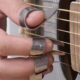 Unveiling the Guitar Thumb Pick: Unlocking the Secrets to Effortless Picking - Master the Art of Playing Guitar and Play Like a Pro