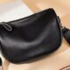 Discover the Captivating World of Crossbody Bags with Guitar Straps - Master the Art of Playing Guitar and Play Like a Pro