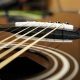 Unveiling the Secrets of Saddles for Acoustic Guitars: A Journey to Enhanced Tone and Playability - Master the Art of Playing Guitar and Play Like a Pro