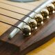 Uncover the Secrets of Guitar String Holders: Discoveries and Insights Await - Master the Art of Playing Guitar and Play Like a Pro