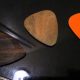 Unveiling the Secrets: Wooden vs. Plastic Guitar Picks for the Discerning Player - Master the Art of Playing Guitar and Play Like a Pro