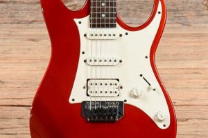 Unveiling the Allure and Power of White and Red Electric Guitars - Master the Art of Playing Guitar and Play Like a Pro