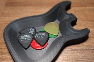 Unleash Your Guitar Prowess with the Ultimate Guide to Guitar Shaped Pick Holders Master the Art of Playing Guitar and Play Like a Pro Unleash Your Guitar Prowess with the Ultimate Guide to Guitar Shaped Pick Holders - Master the Art of Playing Guitar and Play Like a Pro