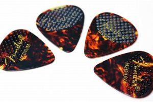 Unveiling the Power of Textured Guitar Picks: Elevate Your Playing Master the Art of Playing Guitar and Play Like a Pro Unveiling the Power of Textured Guitar Picks: Elevate Your Playing - Master the Art of Playing Guitar and Play Like a Pro