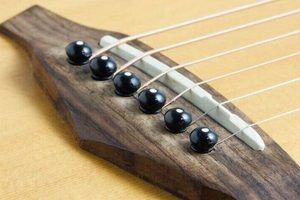 Unlock the Secrets of Acoustic Guitar: Bridge and Pins Revealed Master the Art of Playing Guitar and Play Like a Pro Unlock the Secrets of Acoustic Guitar: Bridge and Pins Revealed - Master the Art of Playing Guitar and Play Like a Pro
