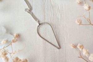 Uncover the Magic: Discover the Allure of Guitar String Necklaces - Master the Art of Playing Guitar and Play Like a Pro