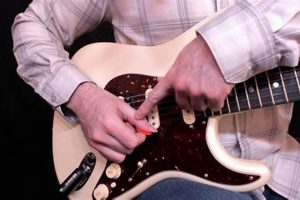 Unleash the Magic of Finger Picking Electric Guitar: Discoveries and Insights Await - Master the Art of Playing Guitar and Play Like a Pro
