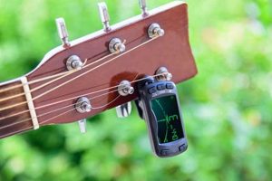 Unveil the Secrets: Discover the Ultimate Acoustic Guitar Tuner - Master the Art of Playing Guitar and Play Like a Pro