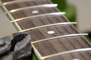 Unveiling the True Cost of Electric Guitar Refrets: A Comprehensive Guide to Pricing - Master the Art of Playing Guitar and Play Like a Pro
