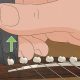 Unveiling the Secrets: Unlocking the Optimal Frequency for Changing Acoustic Guitar Strings - Master the Art of Playing Guitar and Play Like a Pro