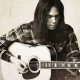 Unveiling the Acoustic Alchemy of Neil Young's Guitar - Master the Art of Playing Guitar and Play Like a Pro