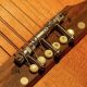 Unleash a World of Acoustic Possibilities with Adjustable Bridges - Master the Art of Playing Guitar and Play Like a Pro