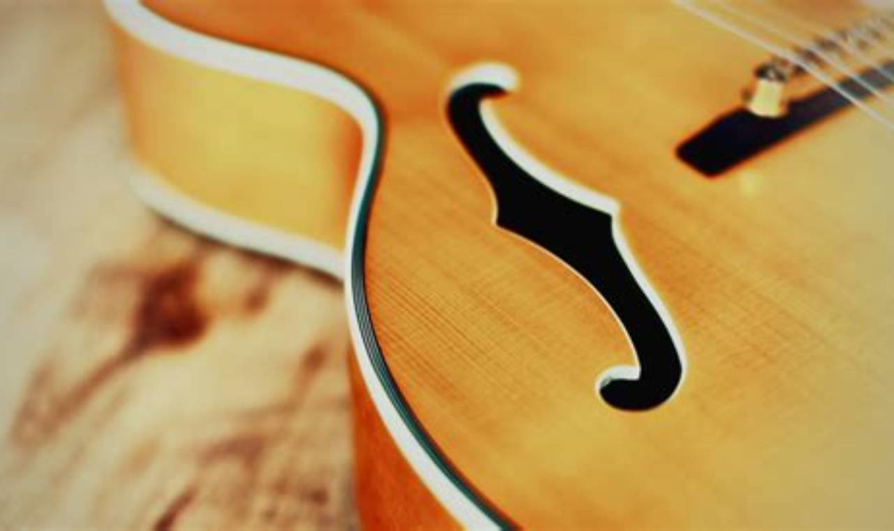 Discover the Enchanting World of Acoustic Guitars with F Holes Master the Art of Playing Guitar and Play Like a Pro Discover the Enchanting World of Acoustic Guitars with F Holes - Master the Art of Playing Guitar and Play Like a Pro