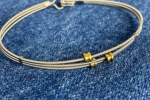 Unveiling the Enchanting World of Bracelets Made from Guitar Strings: Discoveries and Insights - Master the Art of Playing Guitar and Play Like a Pro